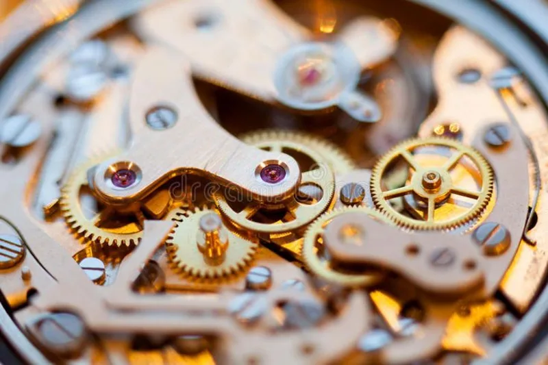 Macro photo of the gears inside a mechanical watch movement